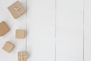 5 boxes on white flooring